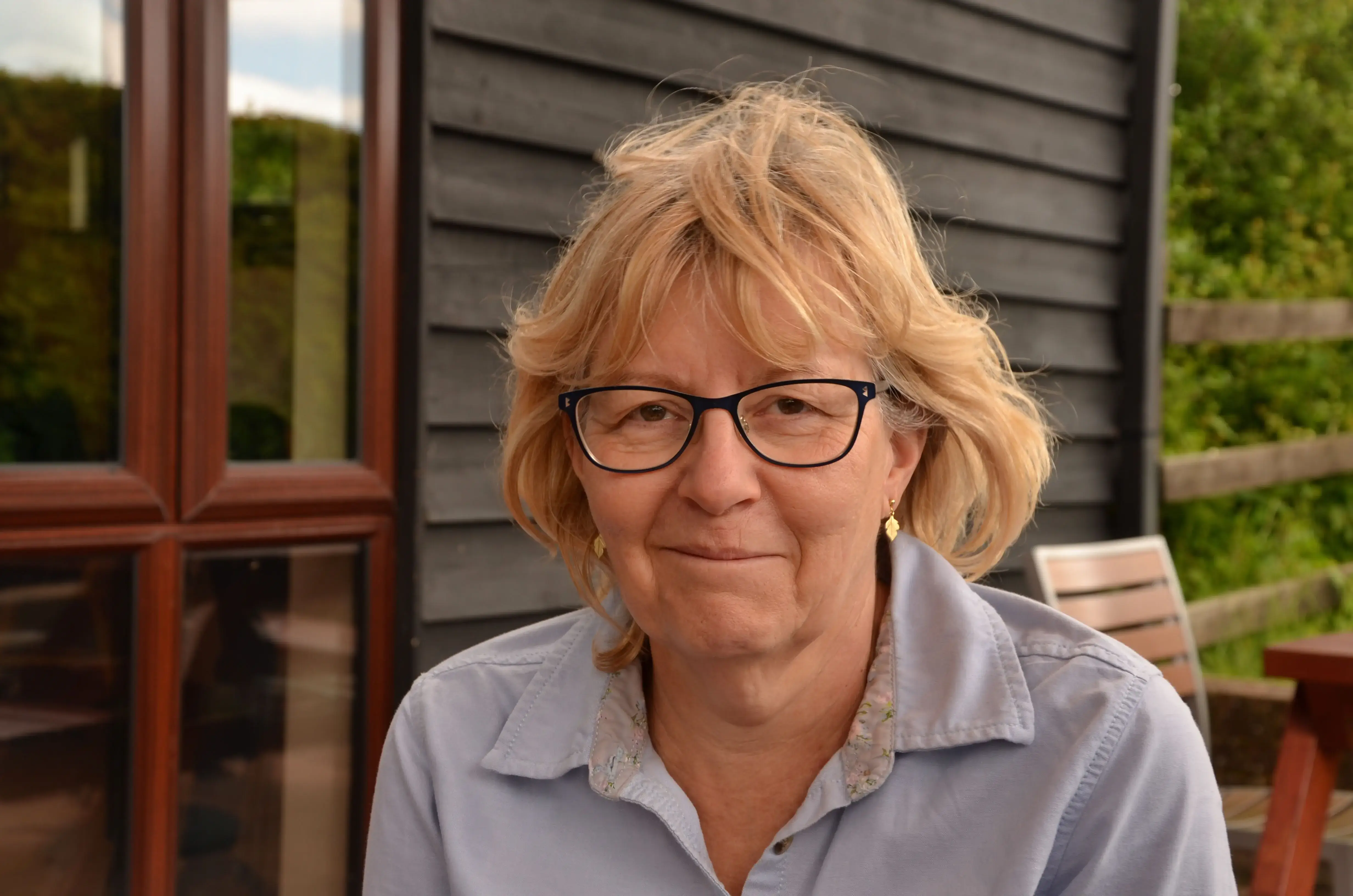 My mum smiling into the camera